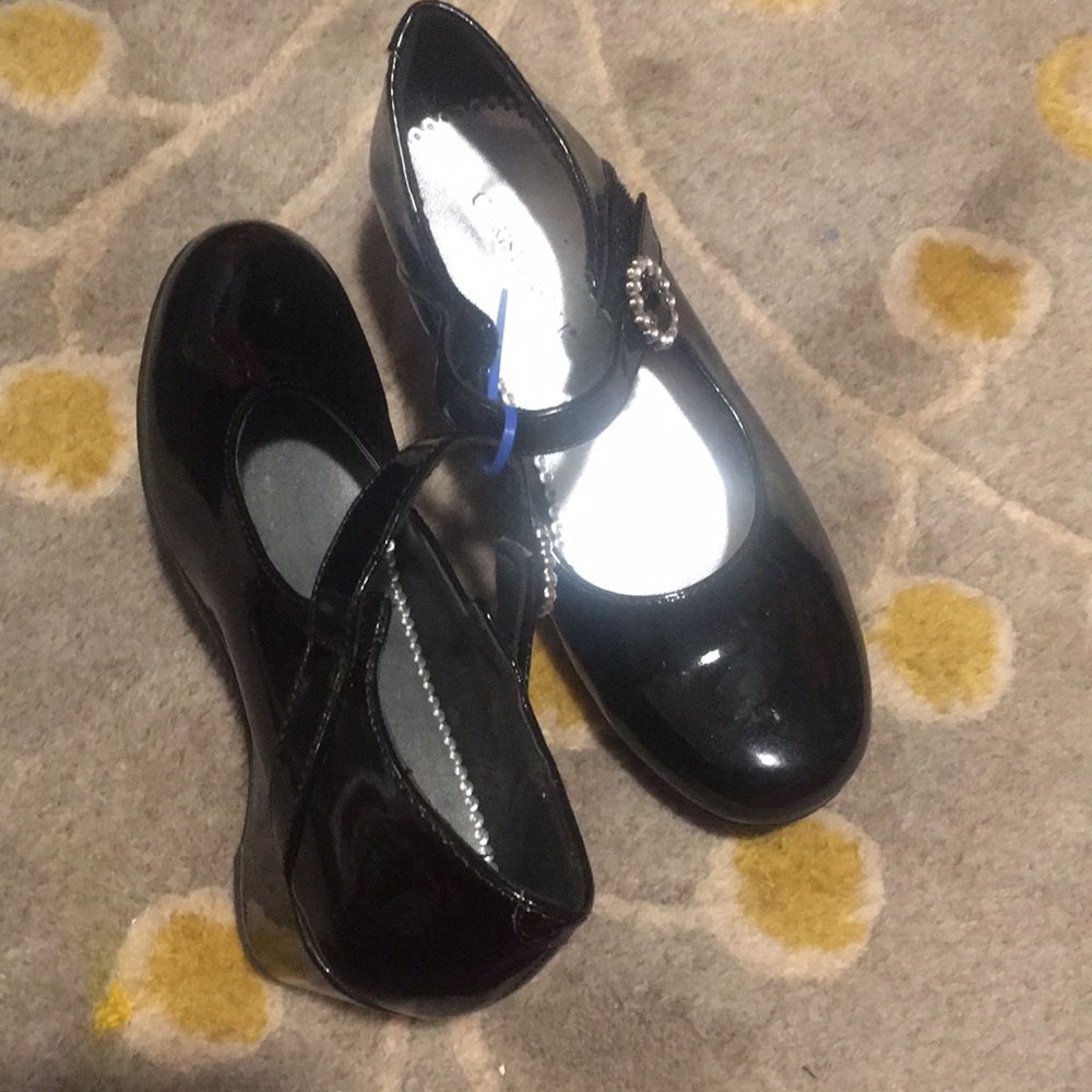 Patient Leather black Mary Janes, size 2 preowned excellent condition.